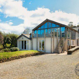 devon stone cottage, timber frame extension, glazed gable end