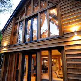 Oak framed home exterior - Carpenter Oak